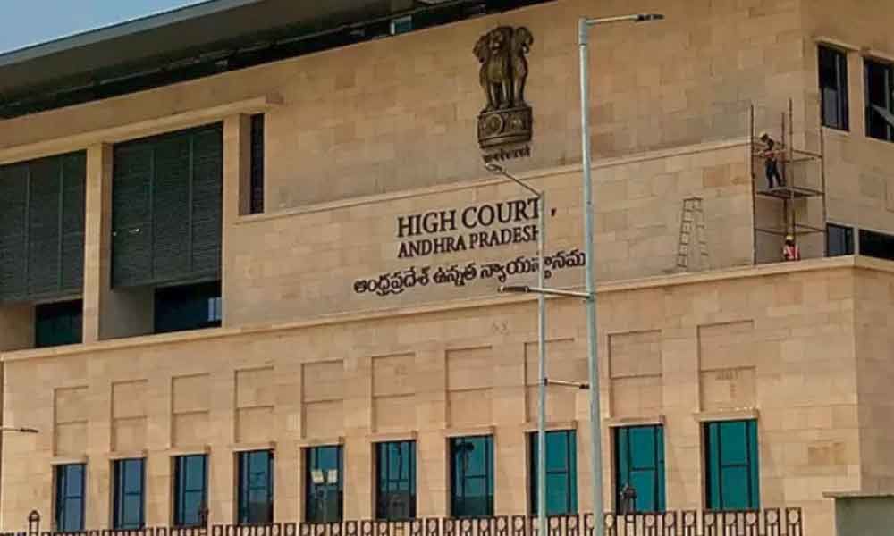 AP High Court stay order on visakha rajiv swagruha lands sale