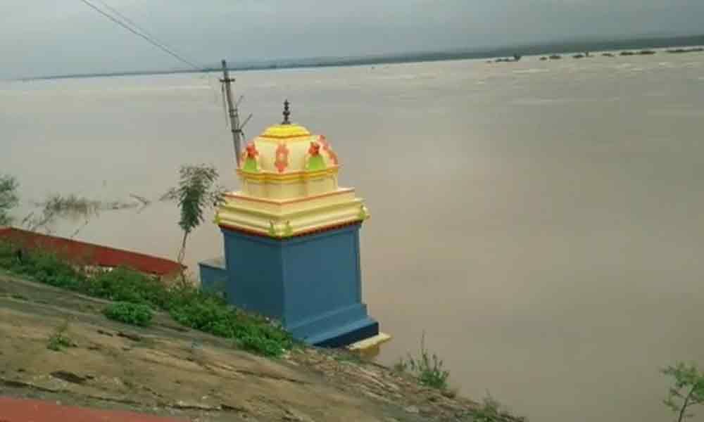 second flood alert issued at ramannagudem pushkar ghat