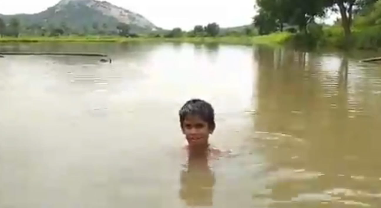 boy requesting telangana government to solve rain water problem video goes viral